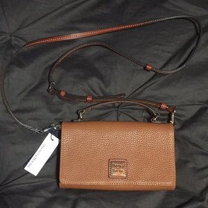 Brand new Dooney and bourke cross body.